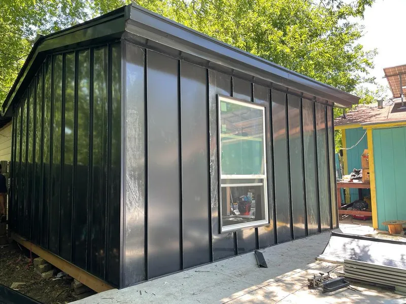 Black standing seam metal wall panels for Metal Roof Installation in Belmont